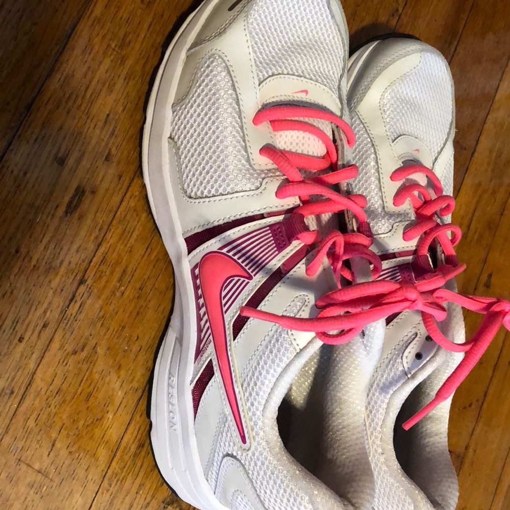 White and pink Nike’s